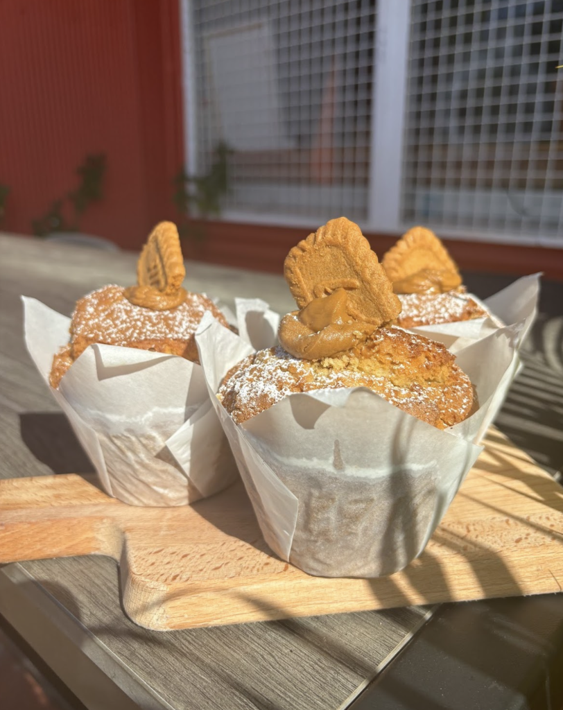 Soft and moist Biscoff muffins with a caramelised biscuit crumble topping, fresh out of the oven.